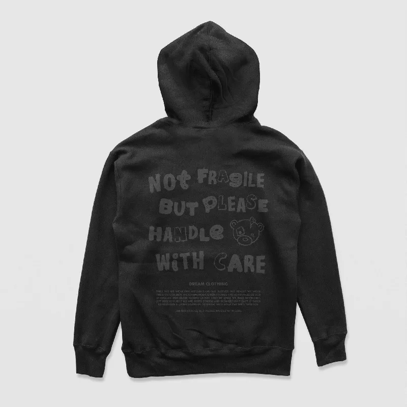 care pattern hoodies -Not Fragile But Please Handle With Care Hoodie (Blackout)