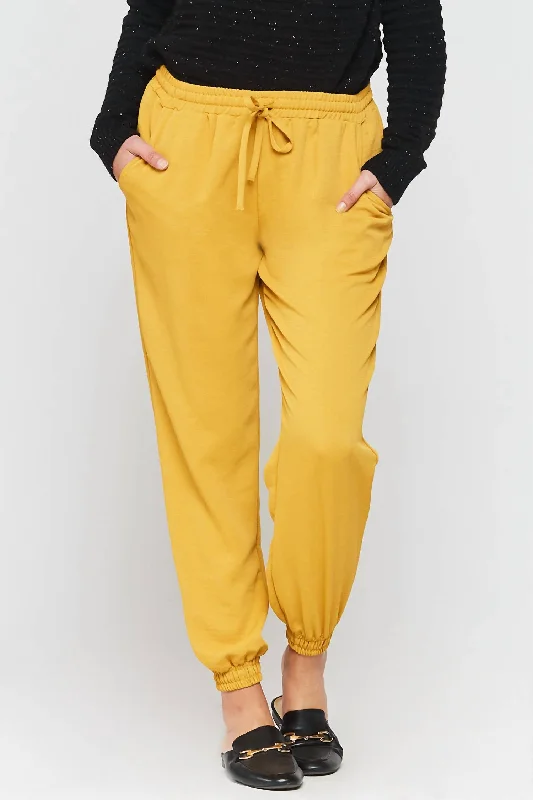 curved hem shorts -curved hem pants -Dixie Jogger Pant In Vintage Saffron